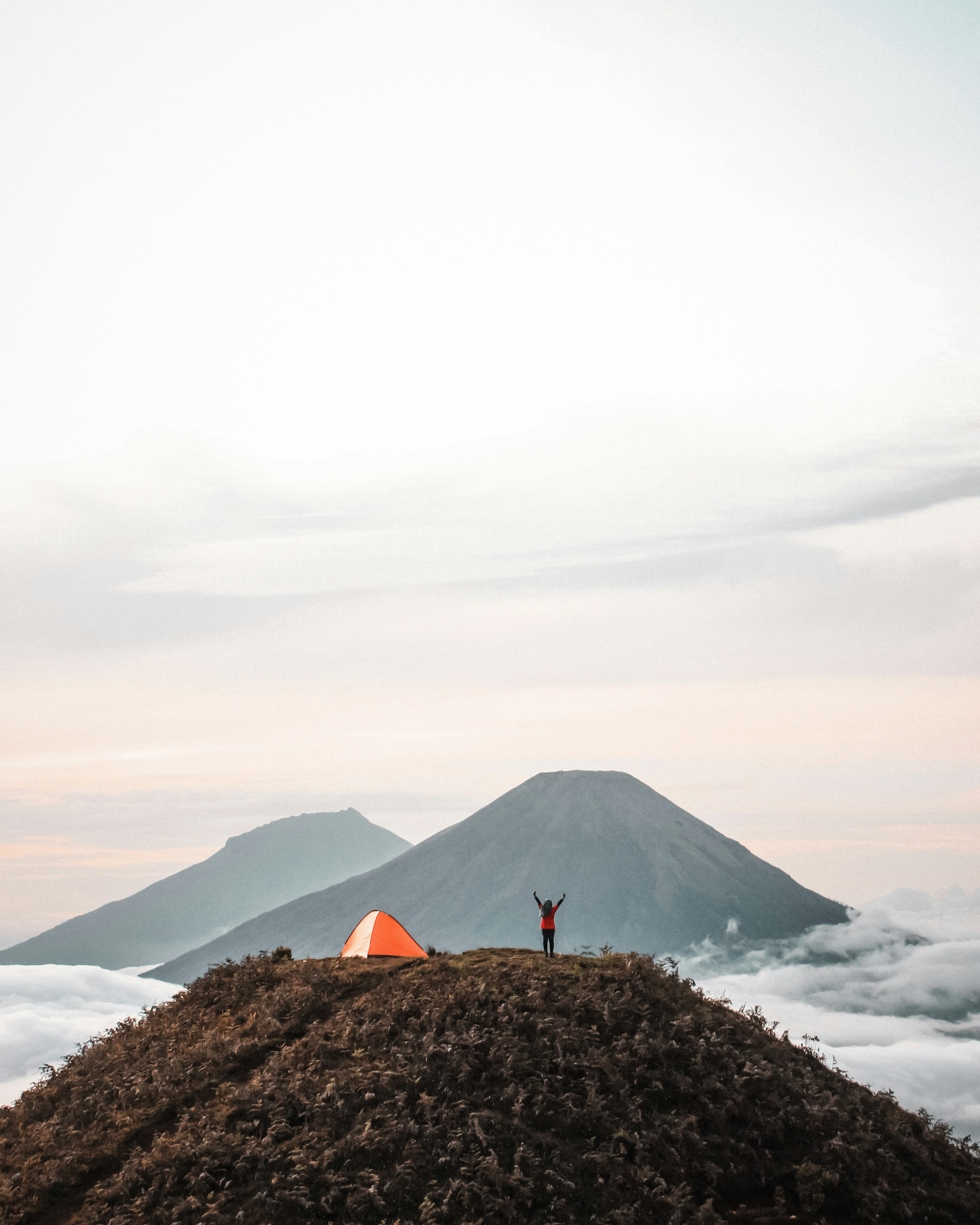 person standing on mountain