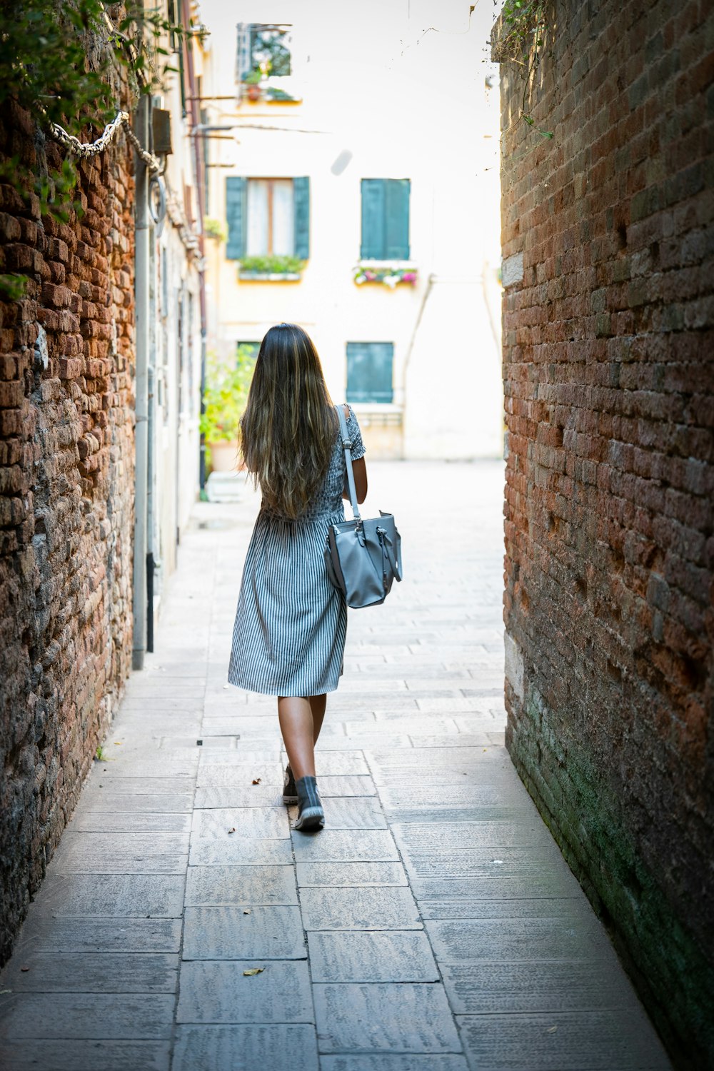 woman standing near wall