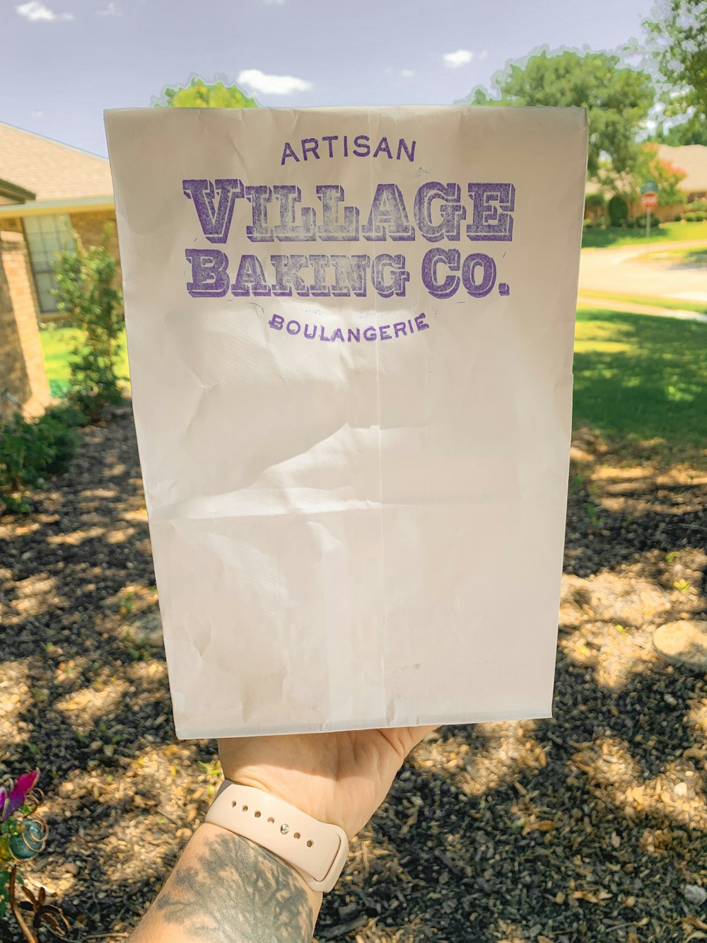 Artisan Village Baking Co. paper bag