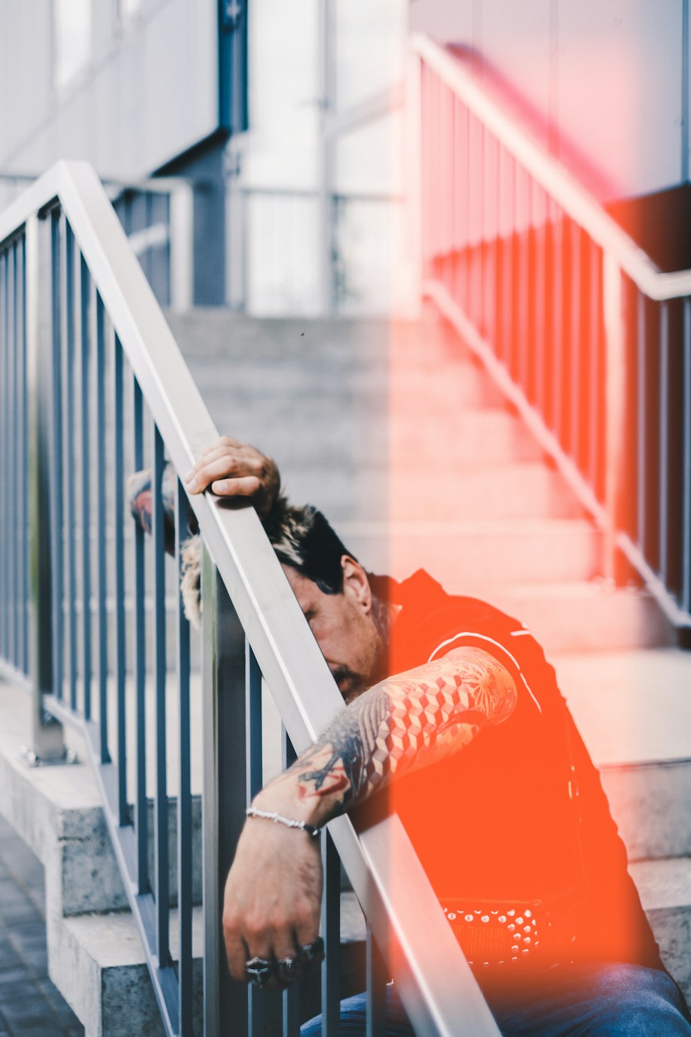 man siting on stair