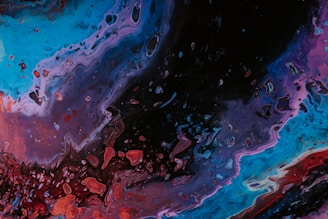 A vibrant painting featuring swirling colors that evoke deep reflection.