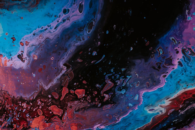 A vibrant painting featuring swirling colors that evoke deep reflection.