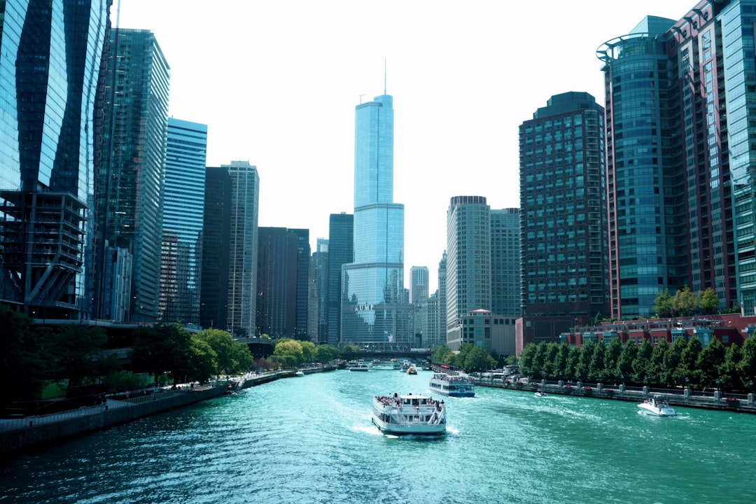 boats on sea viewing high-rise buildings, Trump Tower over the Chicago River