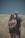 man and woman couple standing in brown grass trail