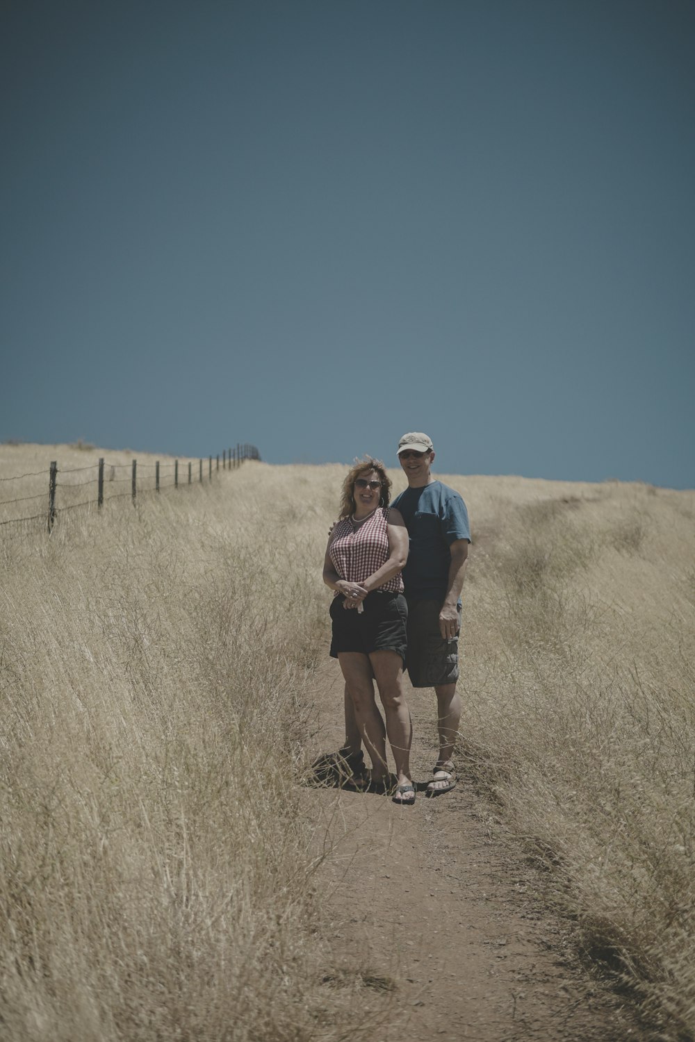 man and woman on pathway