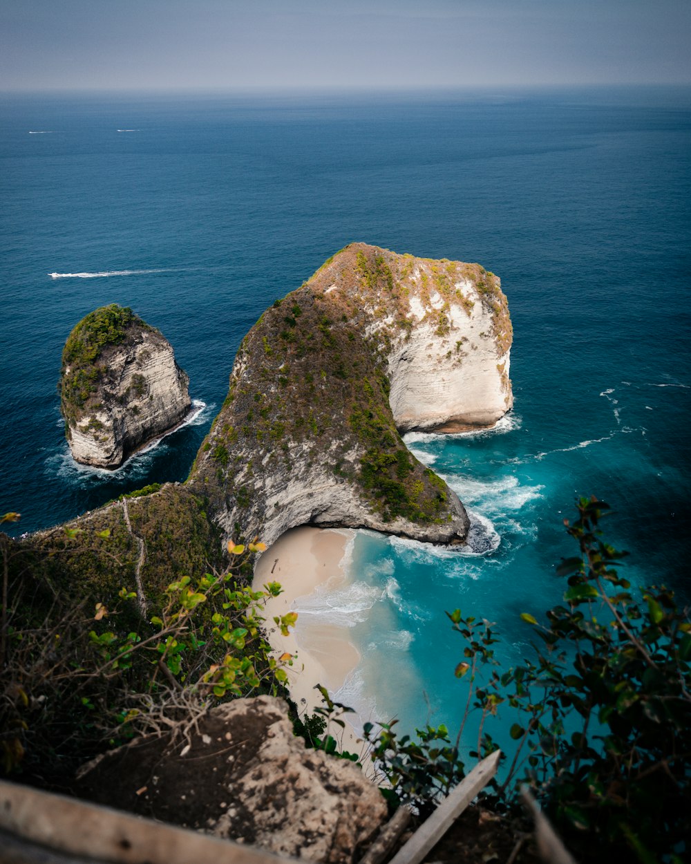 rocky hill viewing blue sea