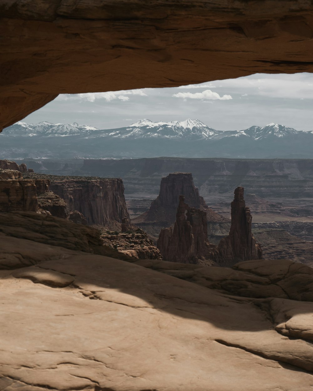 land formations under cloudy sky