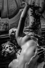 nude woman and man statue