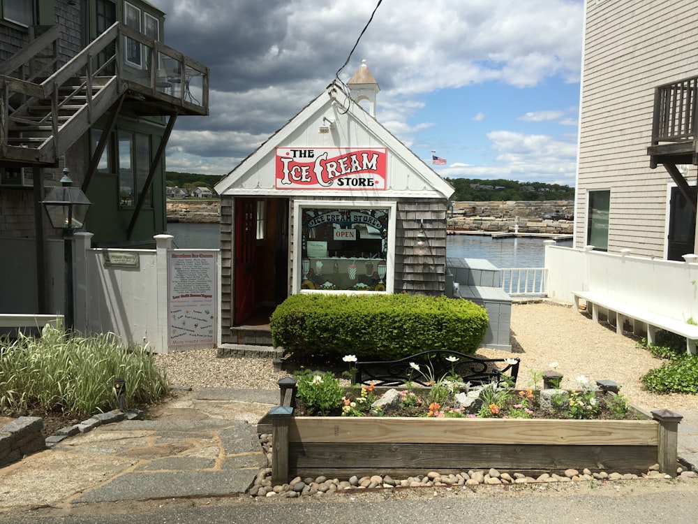 ice cream store beside body of water