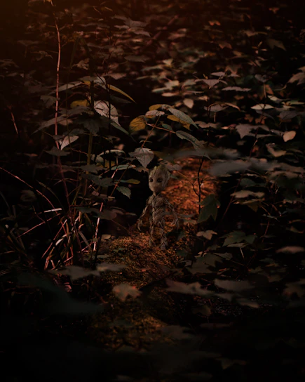 A dynamic in-game screenshot showing the main character navigating a vibrant, mysterious forest filled with glowing plants.