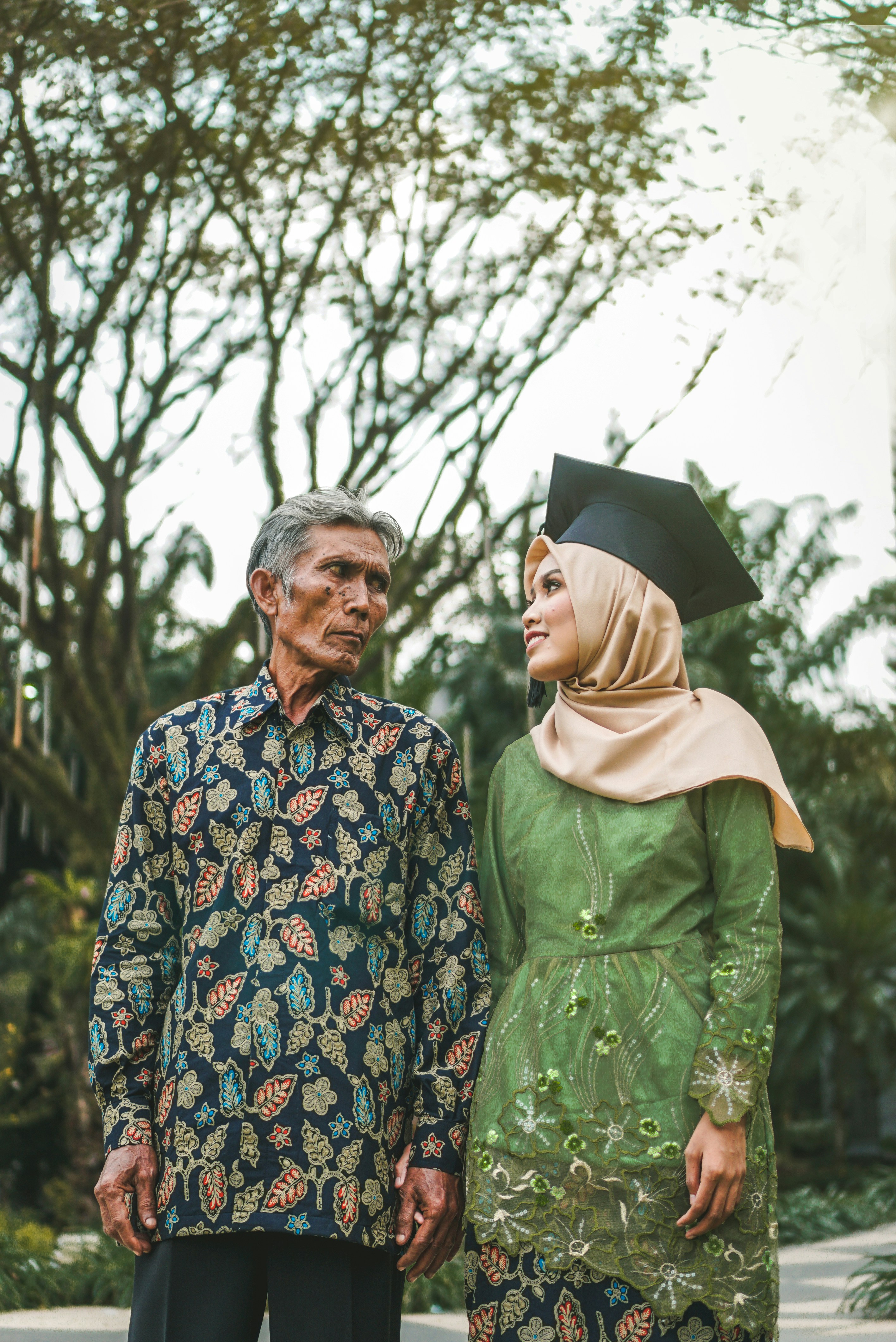 smiling woman looking at her father