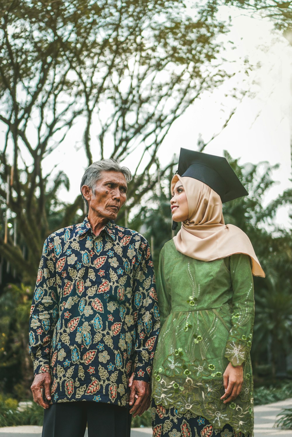 smiling woman looking at her father