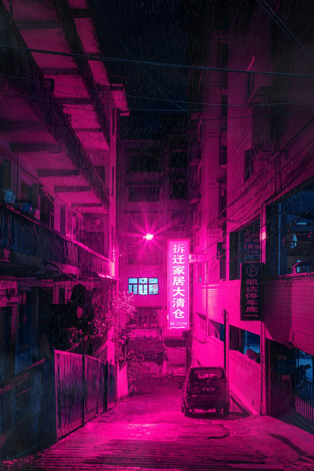 pinkfarbenes LED-Gebäude signiert eingeschaltet