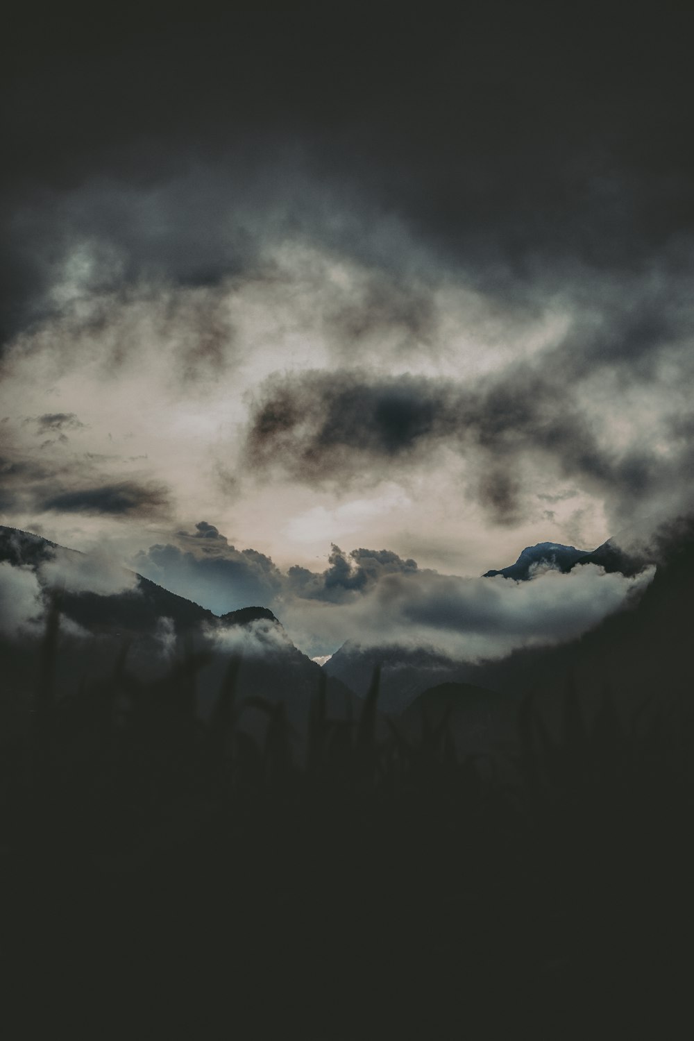 a black and white photo of a cloudy sky