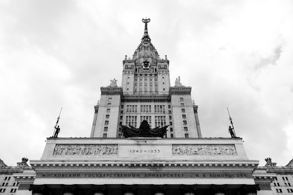 grayscale photo of a stone building