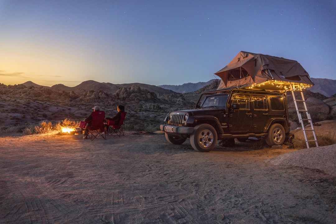 black jeep at a desert, After a day in the mountains.