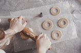 Screenshot of an online baking course video with instructor demonstrating techniques