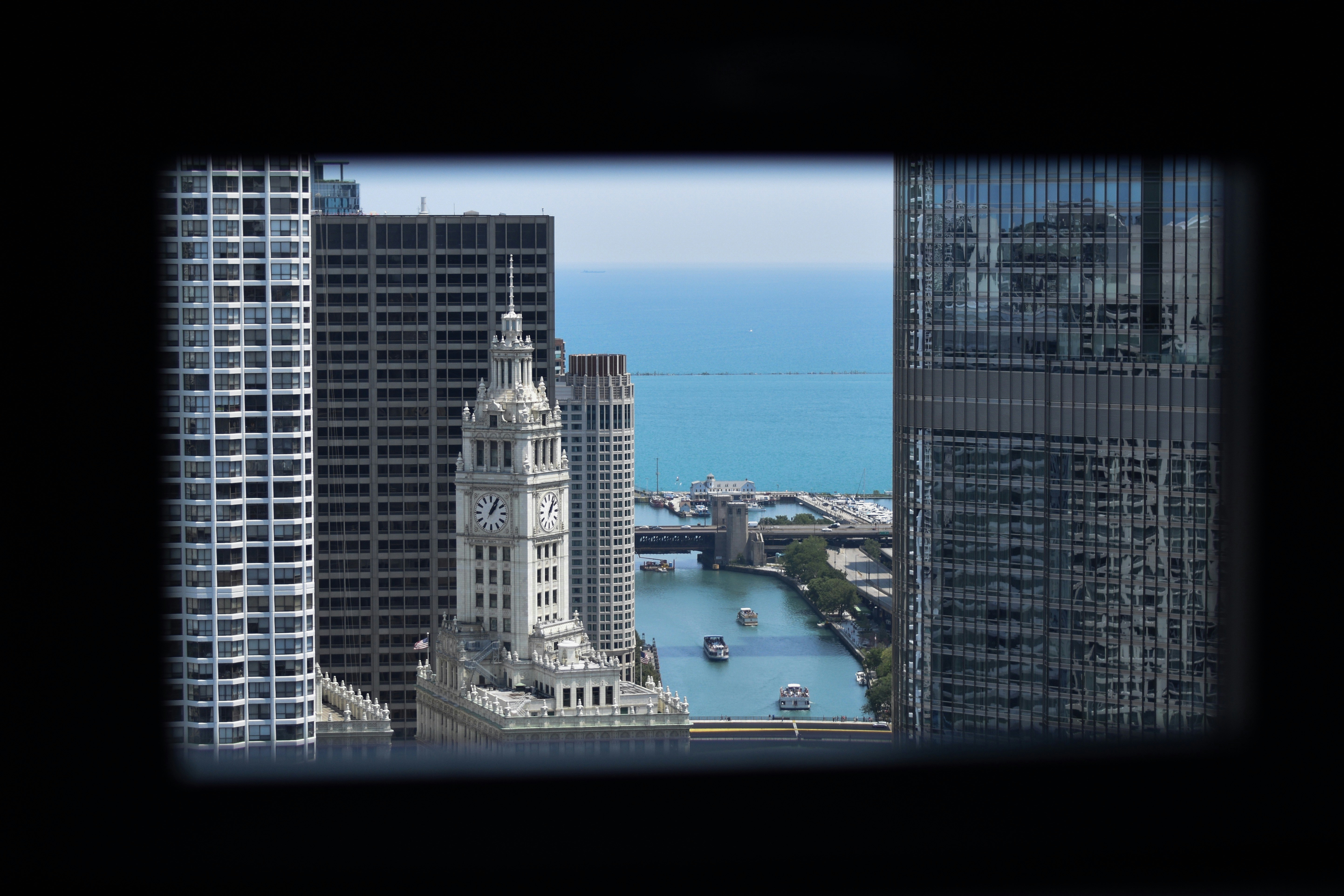 rooftop pool deck with residents enjoying the view of the Chicago skyline - west loop two bedroom apartments