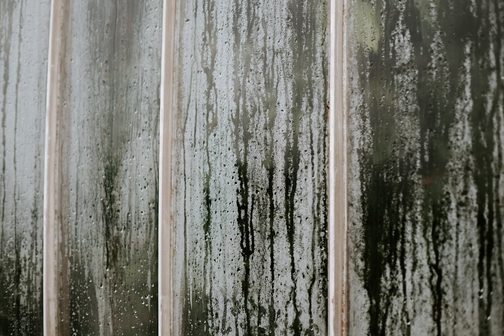 a close up of a window with condensation on it
