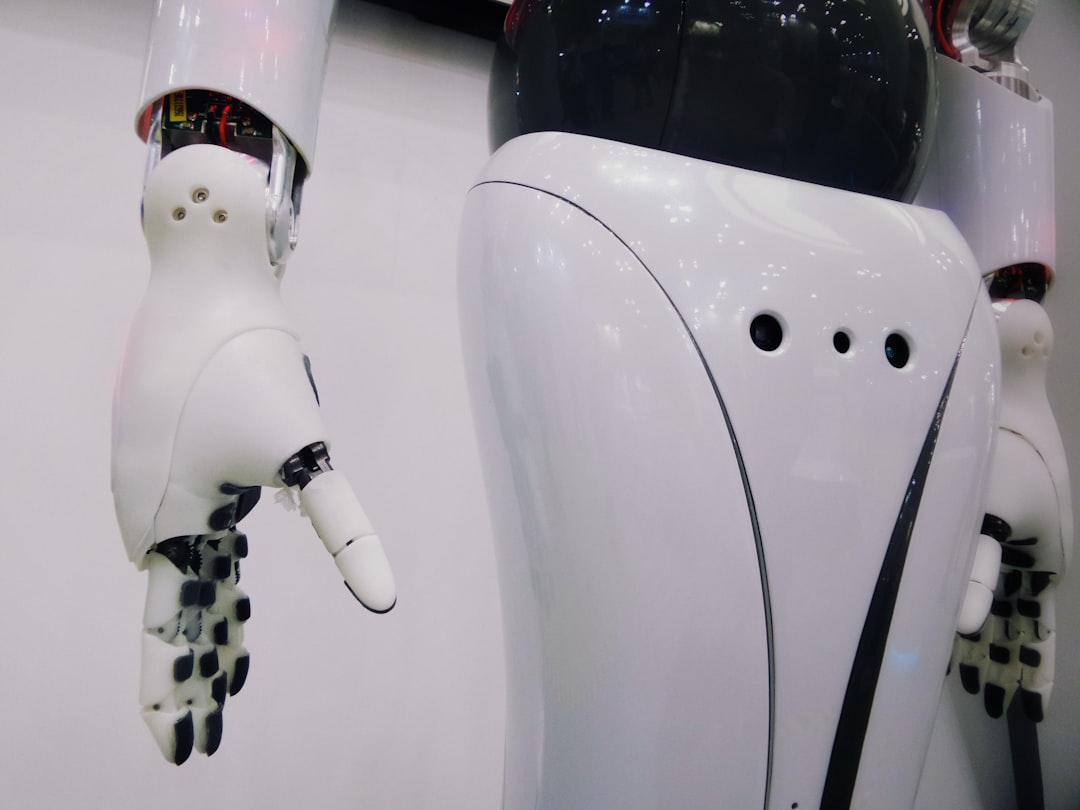 white and black robot, Fembot Beta