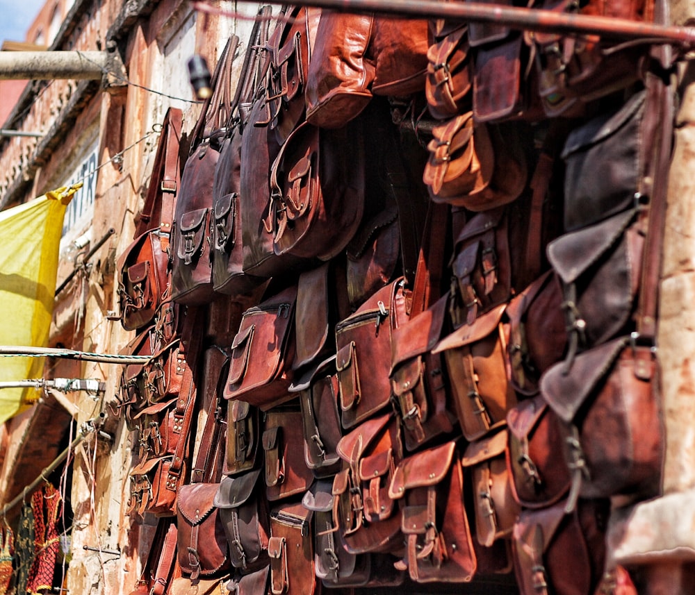 closeup photo of leather bags