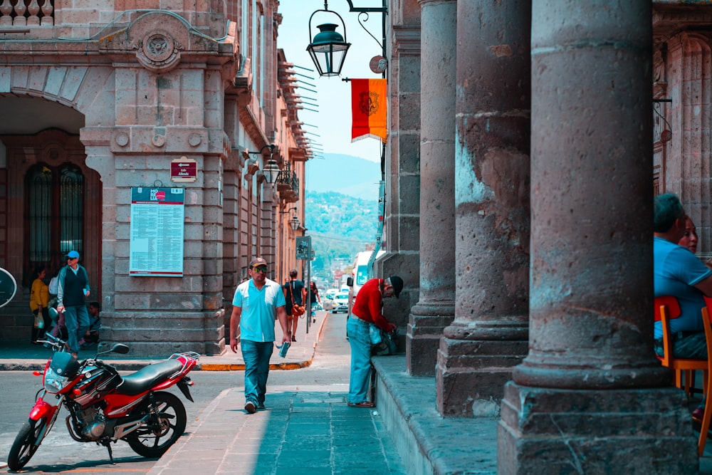 people walking between alley road