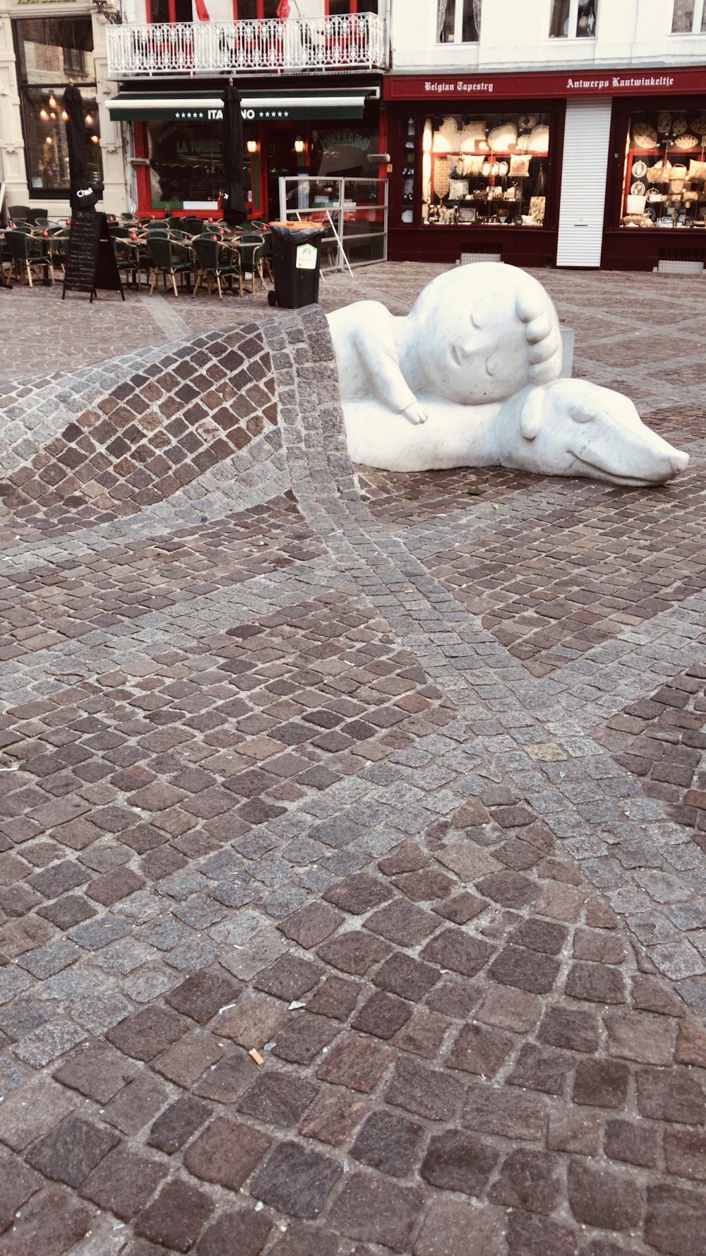 white statue near building