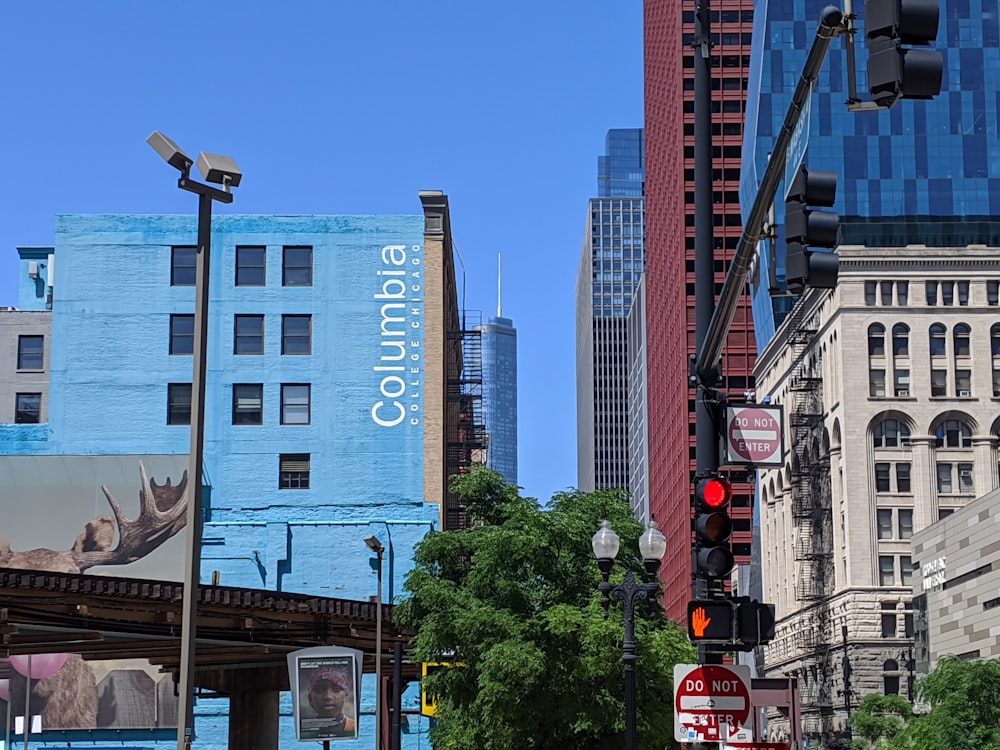 red and blue concrete buildings at daytime