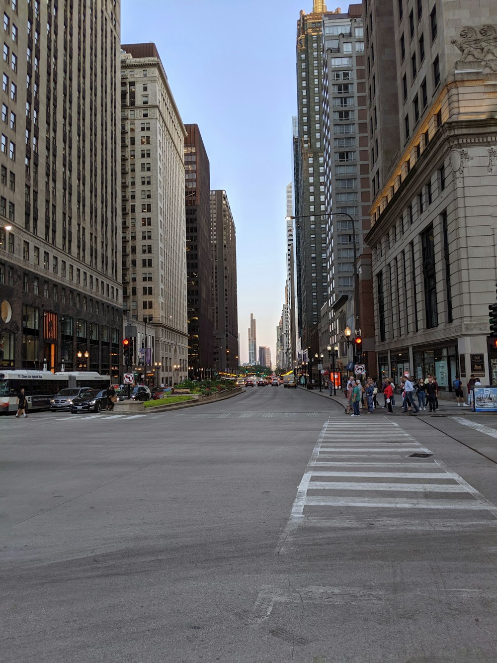 a city street filled with lots of tall buildings