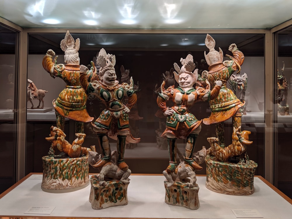 four god figurines