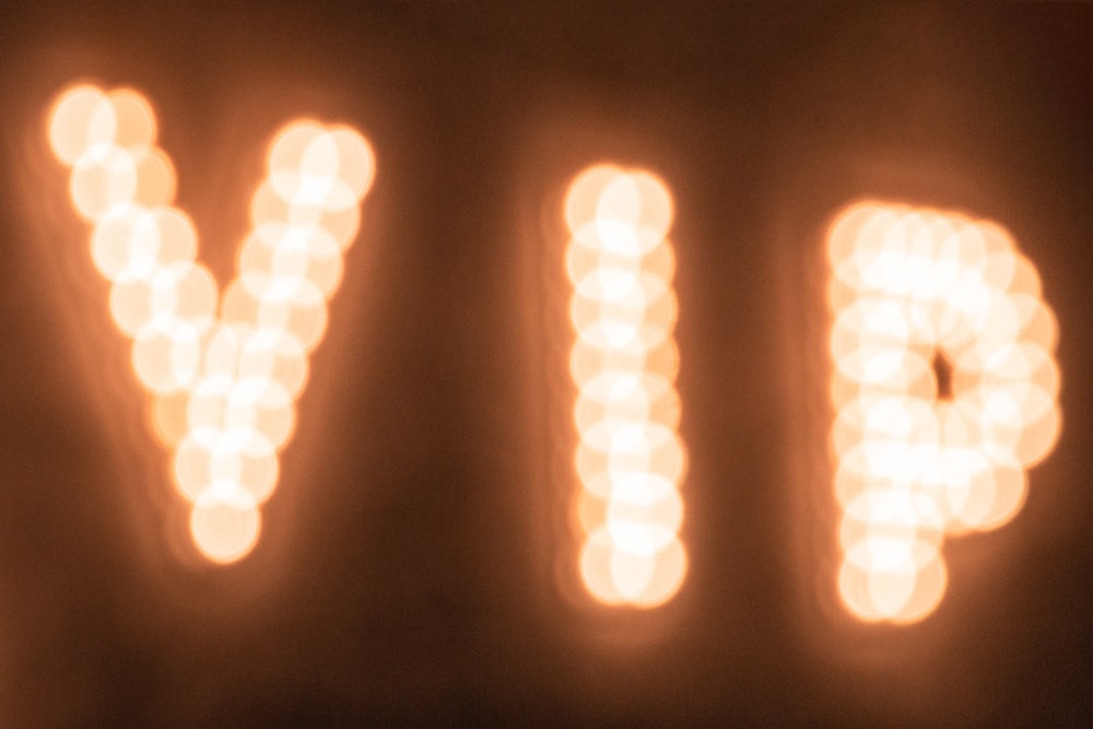 VIP light text close-up photography