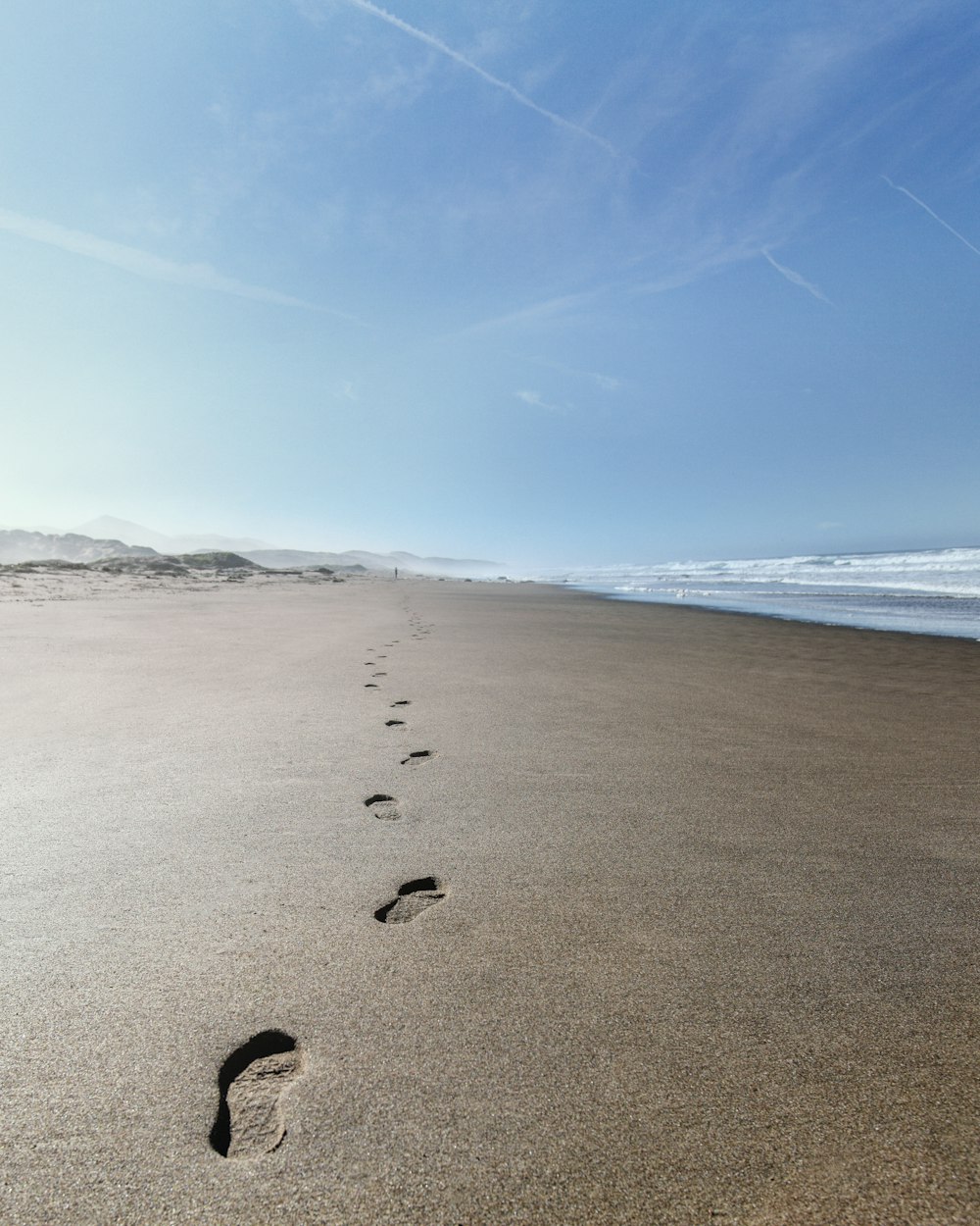 close-up of footprints on shore