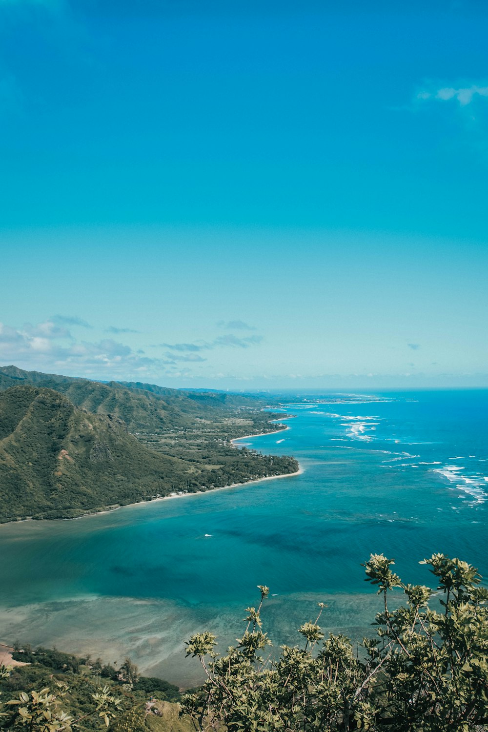 aerial photography of sea under blue sky