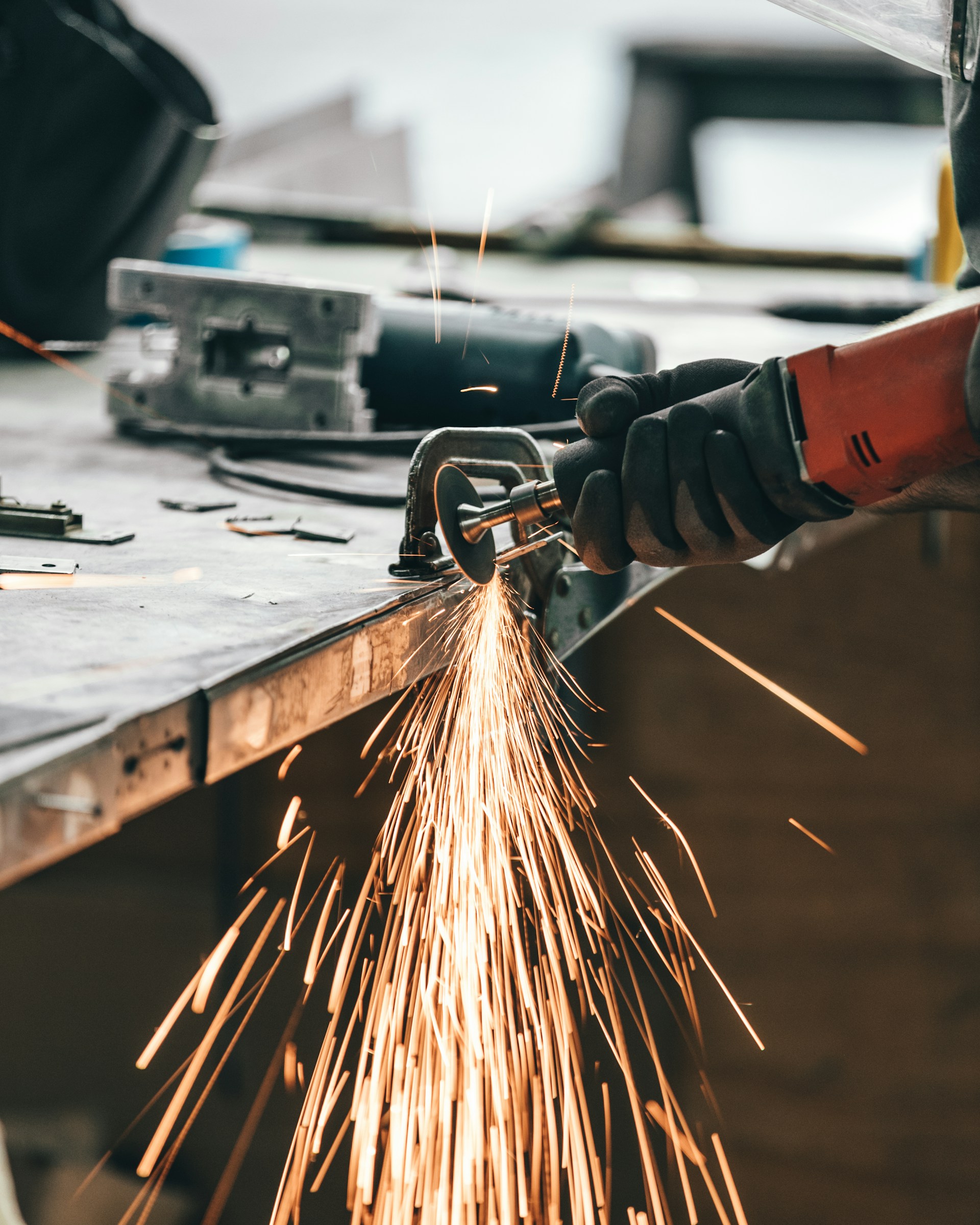 man cutting metal