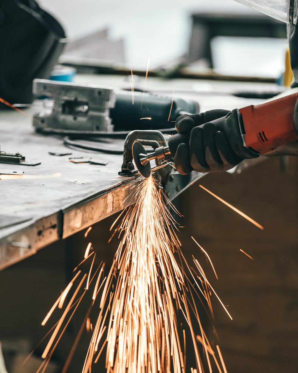 man cutting metal