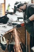 man using angle grinder