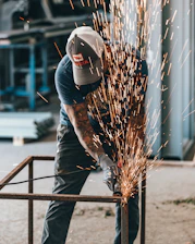 man holding grinder
