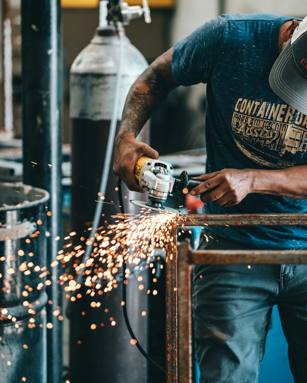 man using angle grinder