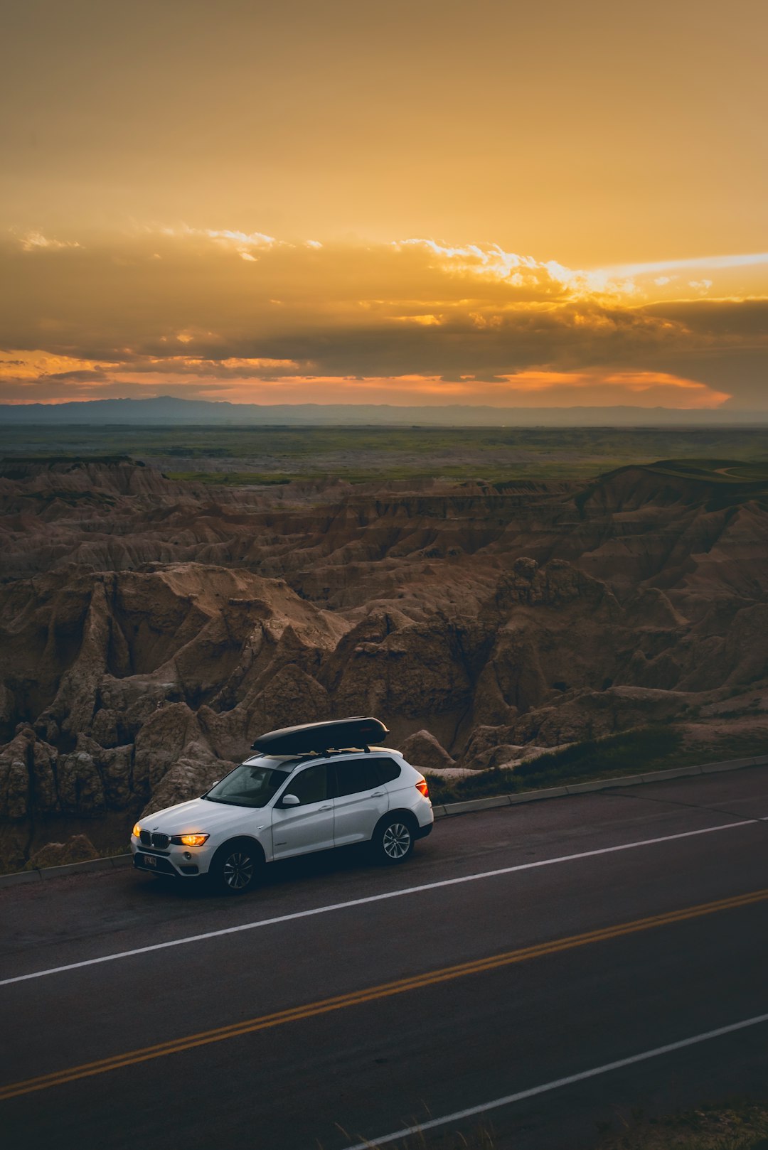 white vehicle on road