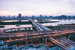 Cityscape showing transportation infrastructure at dusk.
