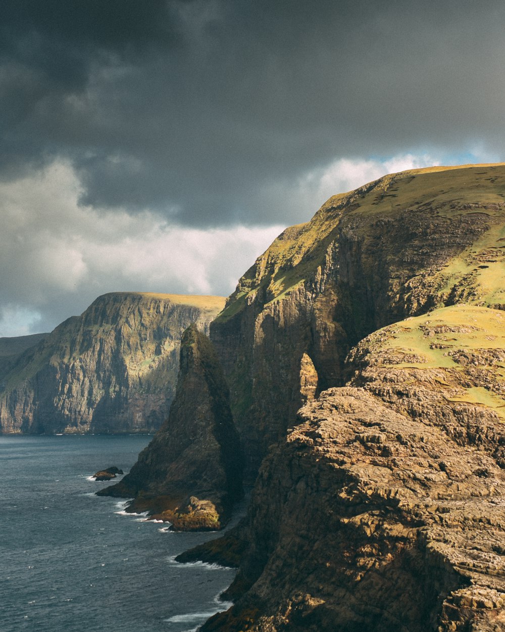 cliff beside sea