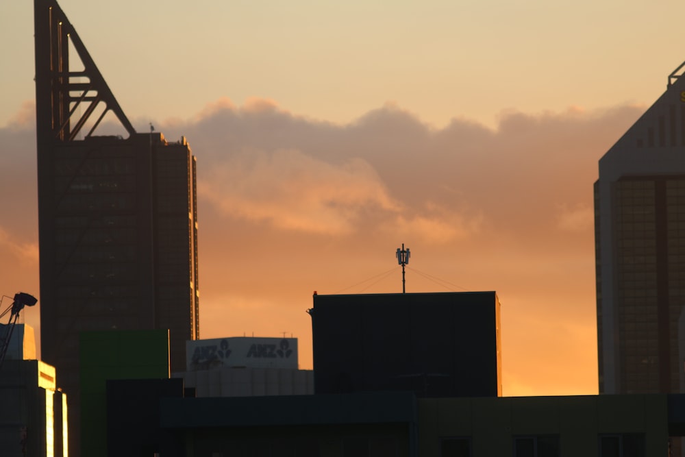 a view of a city skyline at sunset