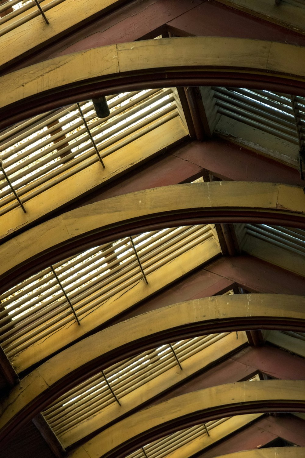 a view of the ceiling of a train station