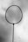 A silhouetted tennis racket is held against a cloudy sky, with the strings clearly visible.