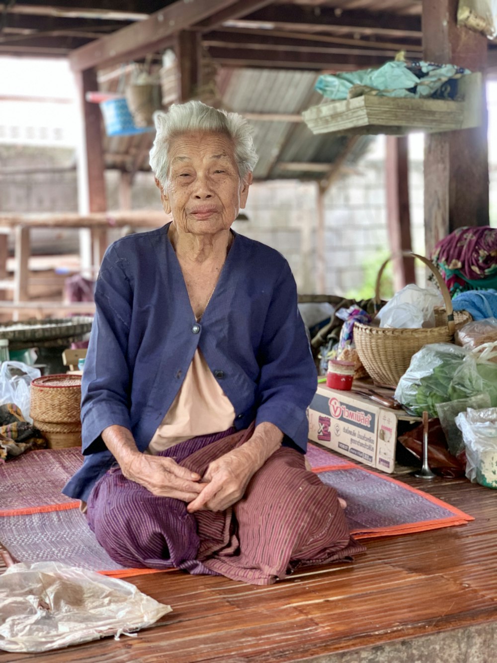 woman kneeling on wooden floor