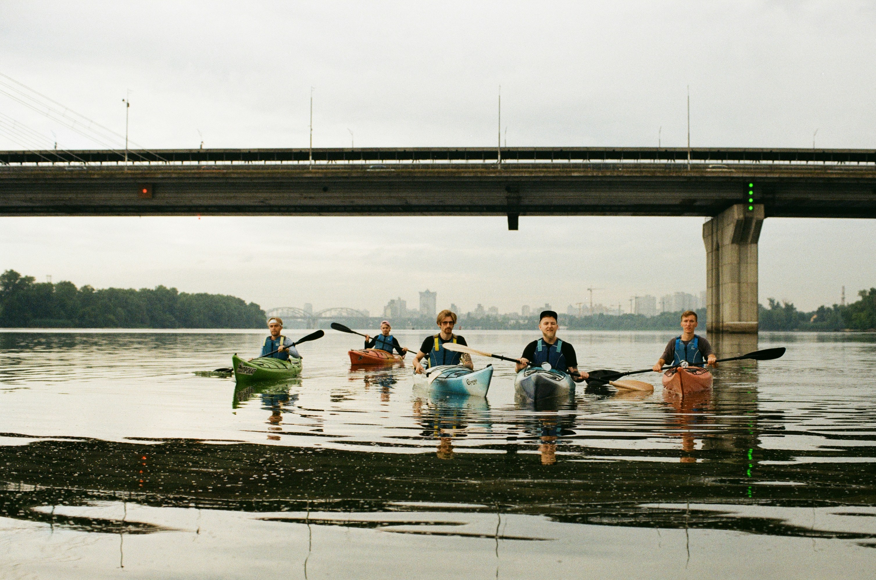 men on kayaks