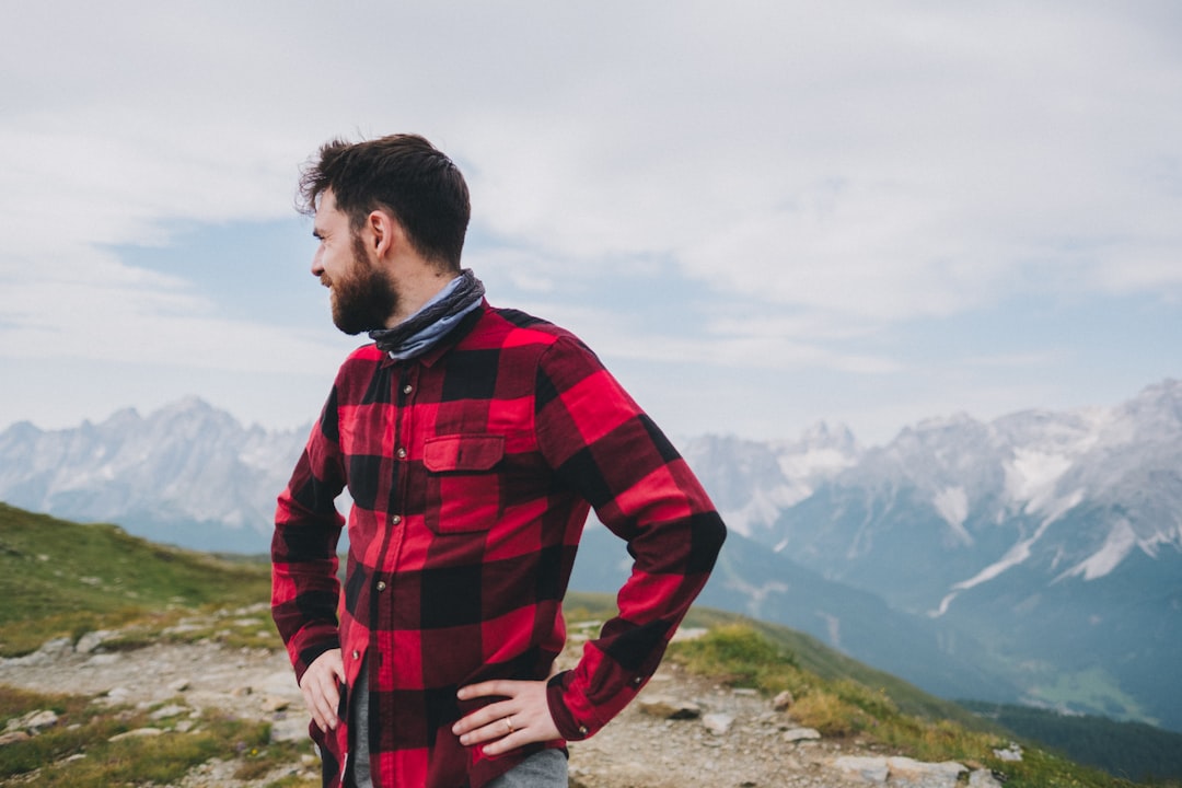 man in red and black flannel shirt
