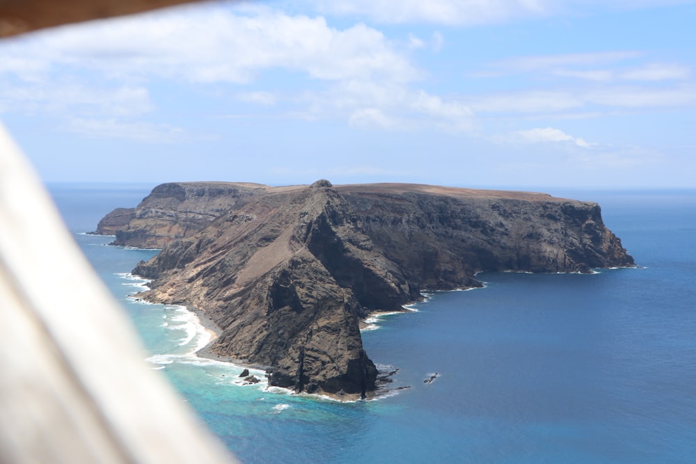 island under blue sky