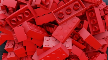 pile of red toy blocks