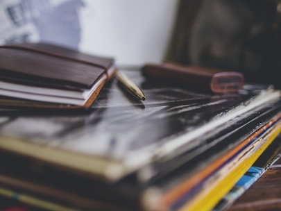A cozy office scene with books and journals being prepared for publishing.